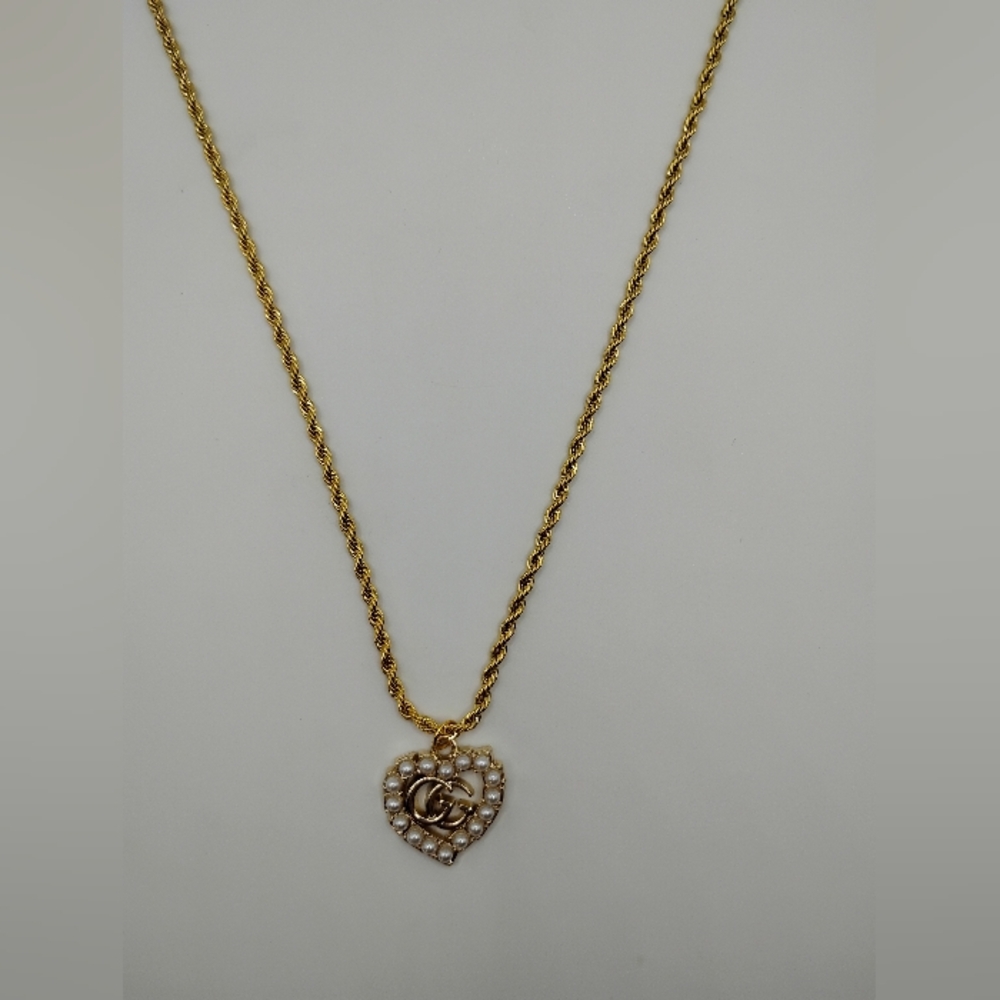 Gucci Pearled Heart Charm On A 14K Gold Necklace With A Matching Bracelet